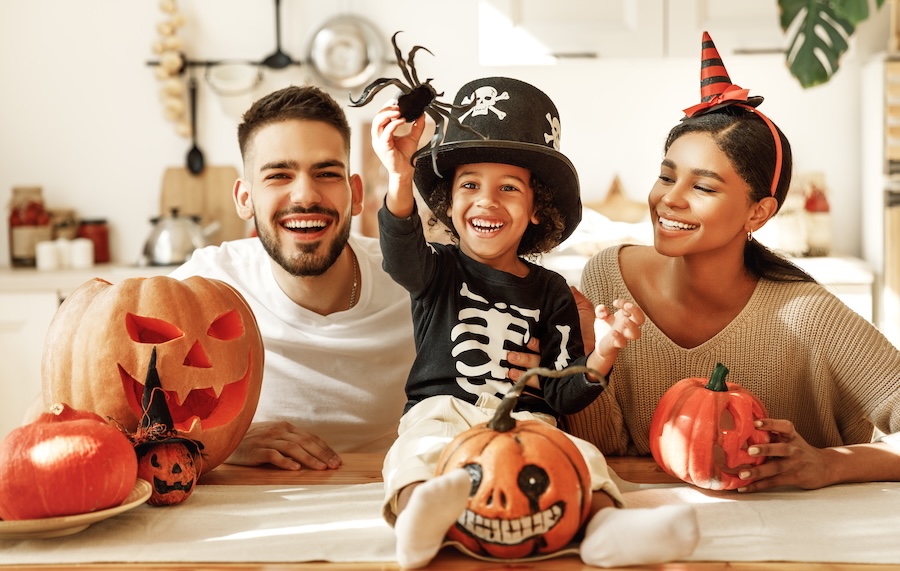 family celebrating halloween looking for Halloween candy alternatives