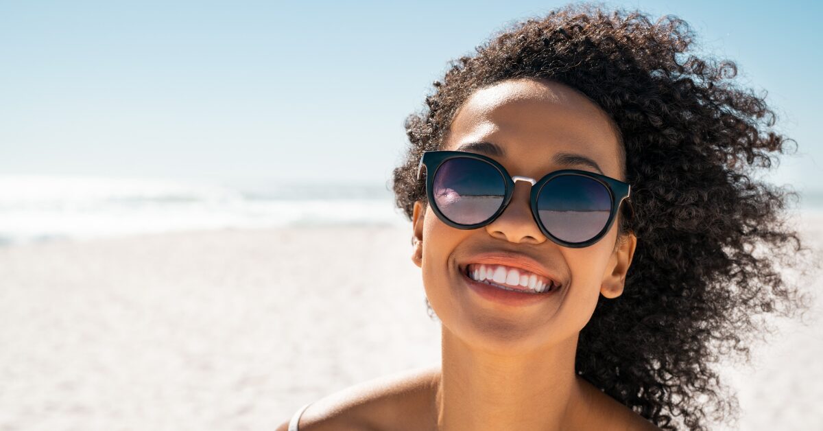 smiling woman at the beach